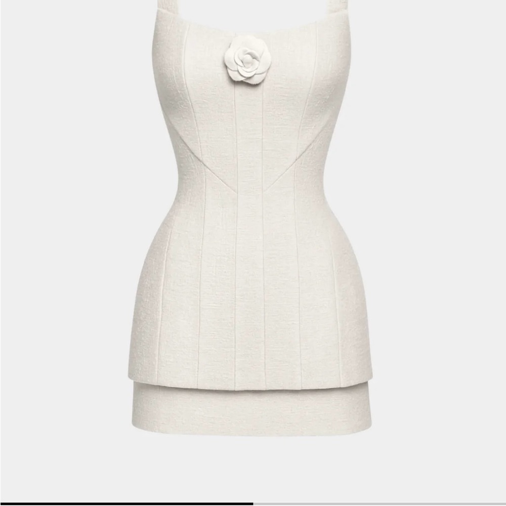 Ivory Sculpted Mini Dress with Floral Accent